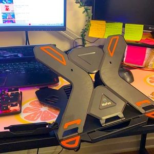 Laptop stand with a phone or small tablet holder. Very durable and not used.